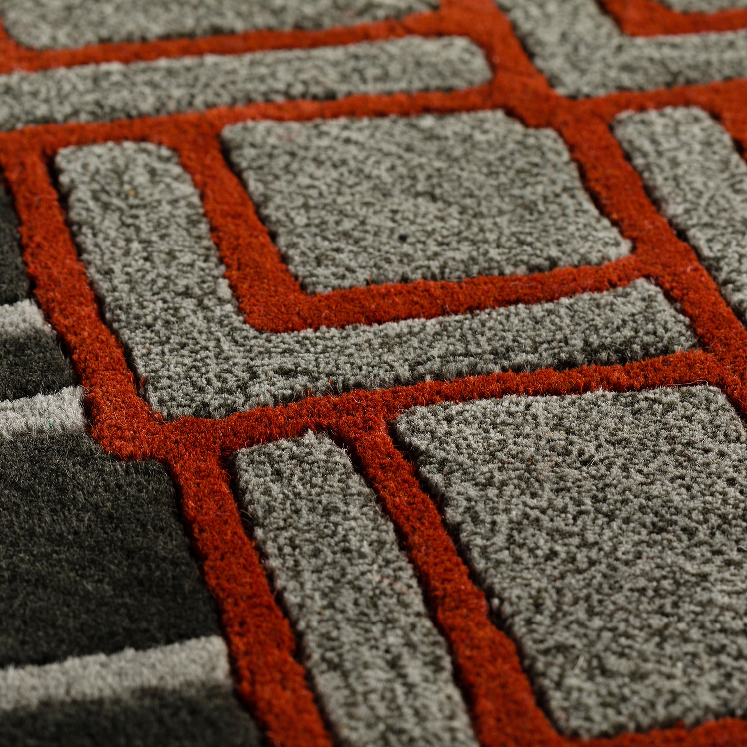 Agra rug closeup of red black and grey rug